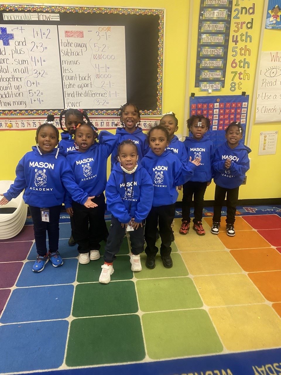  students wearing mason hoodie